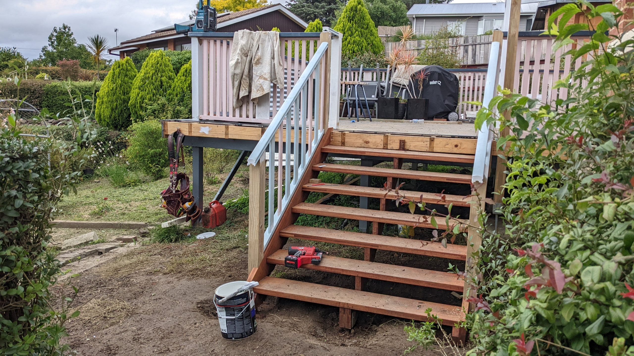 Replacement merbau deck stairs and boards under construction in Manuka