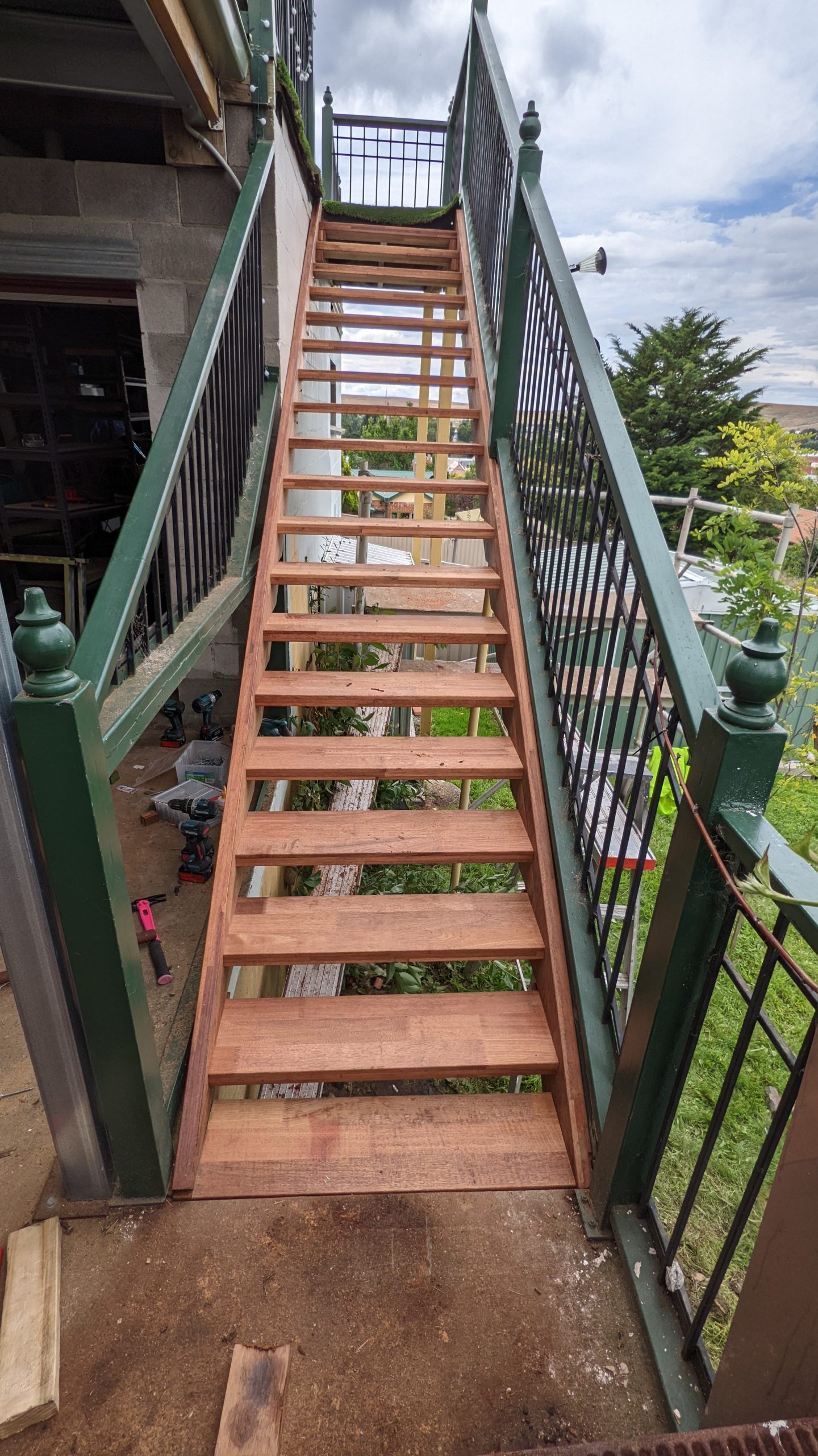 New merbau timber access stairs to an elevated deck in Garran